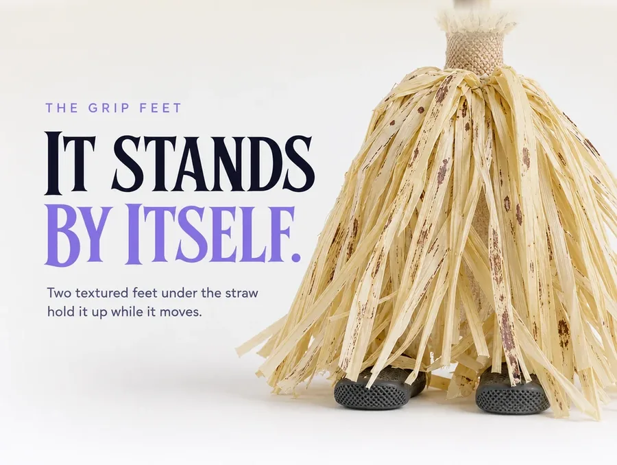 Close studio view at floor level of the two textured grip feet under the straw