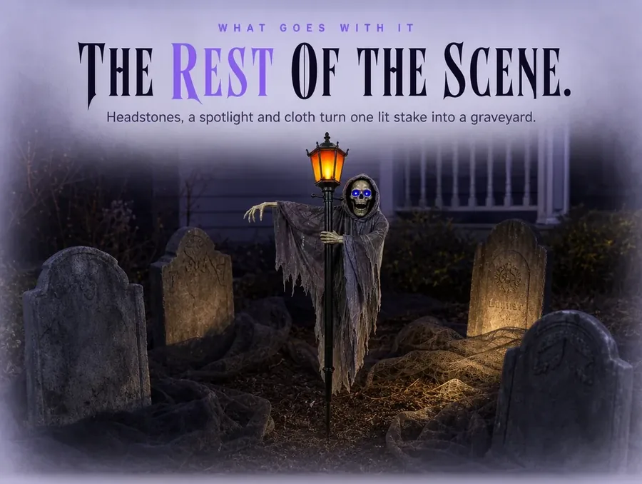 A planted bed built into a small graveyard around one lit gaslight ghoul, with headstones and cloth