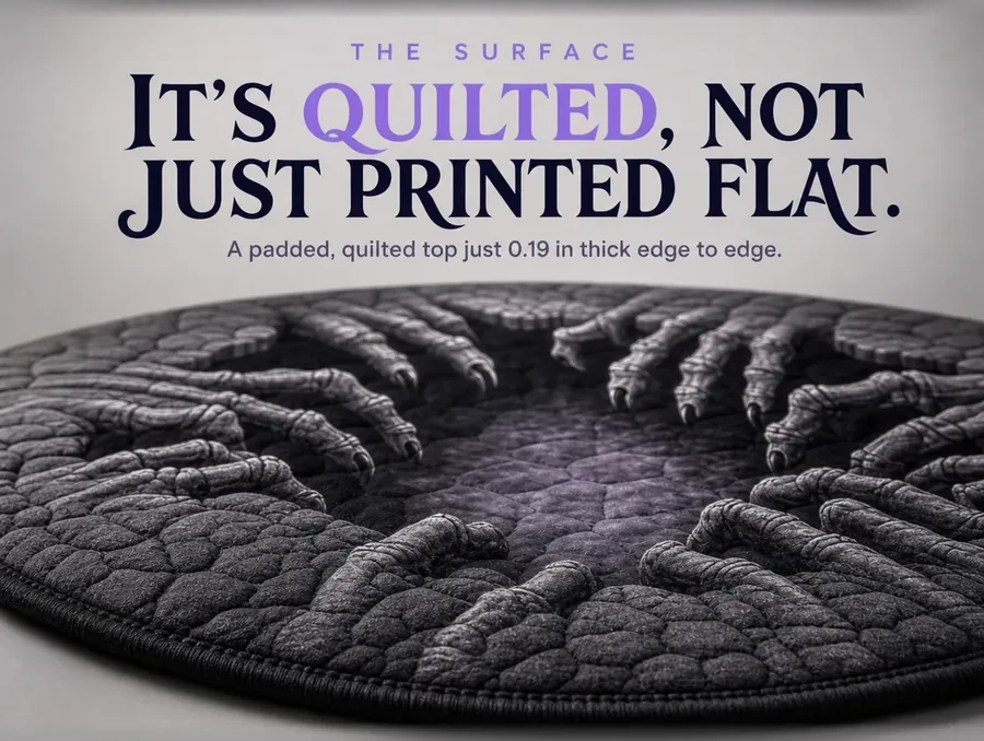 Close-up raking light on the quilted fabric texture at the edge of the illusion rug.