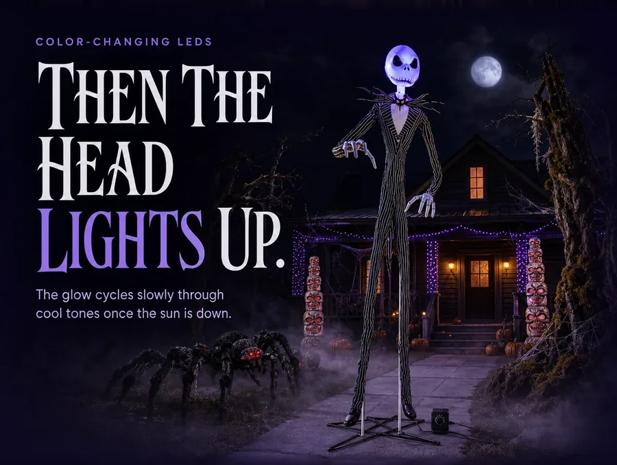 The figure's head glowing with cool blue-violet LED light against a fully dark yard at night.