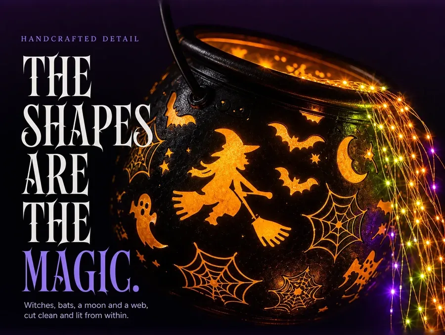 Extreme close-up of the cauldron's glowing amber cutout shapes at night